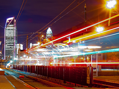 Night time picture of lights drawn to imitate speed