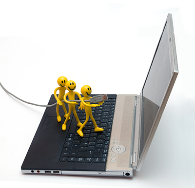 laptop with little men on it