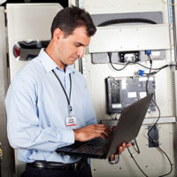 Technician performing programmed maintenance