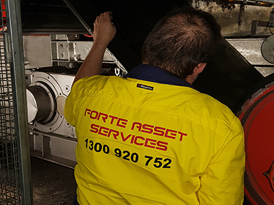 Forte Technician inspecting equipment as part of daily maintenance checks and tests