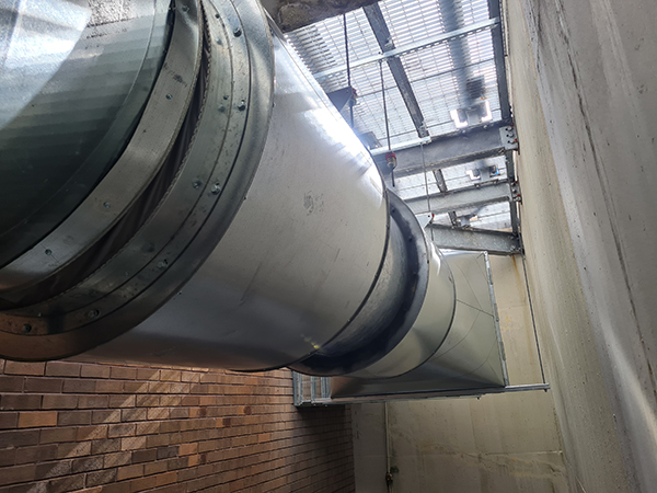 our Fire Protection Services Technician working on AFSS for HVAC and a Supply air Duct probe in Sydney