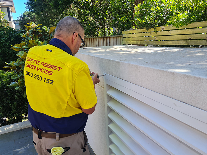 our Fire Protection Services Technician working on AFSS for HVAC and a Supply air Duct probe in Sydney