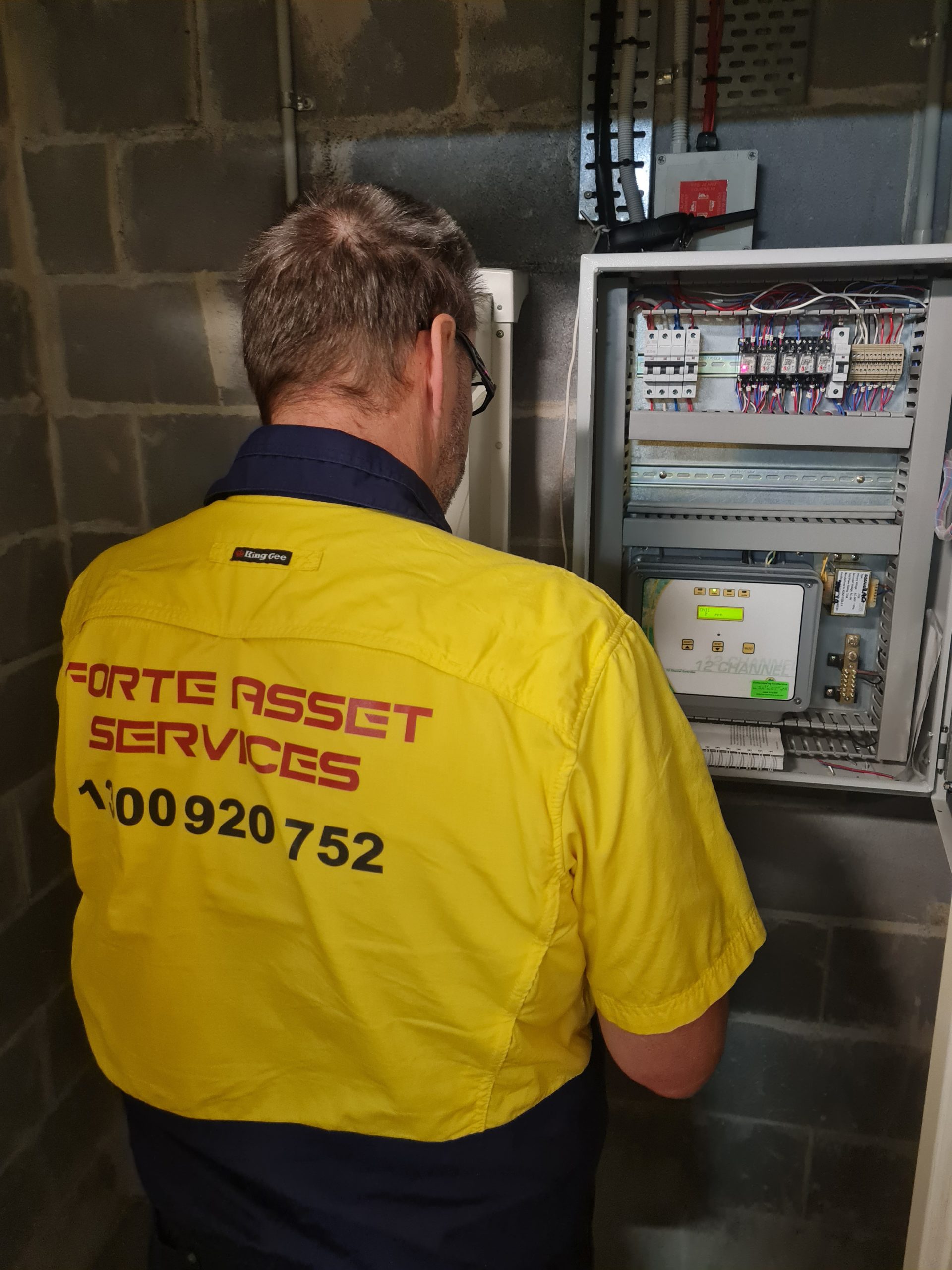 our Fire Protection Services Technician working on AFSS for HVAC and a Supply air Duct probe in Sydney