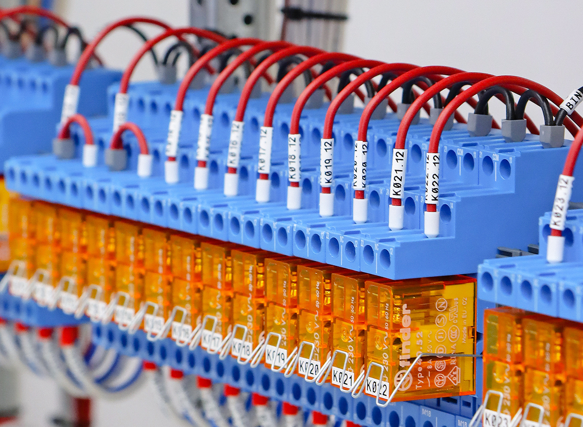 Low Level Interface relay Logic in a control panel switchboard